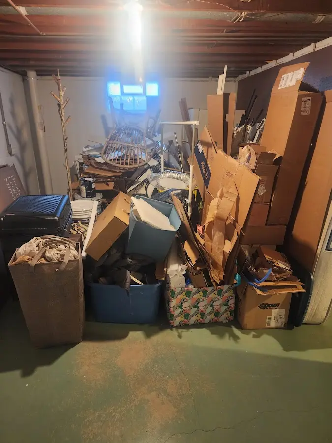 Roll-off dumpster container at job site for Yard Waste Dumpster Rental in Tewksbury